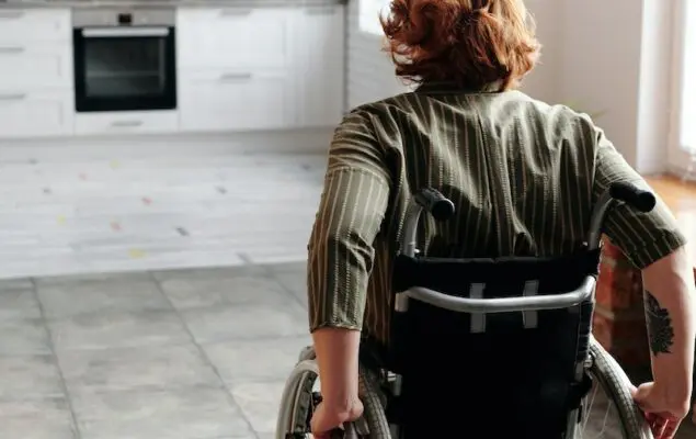 Woman Moving Using Wheelchair