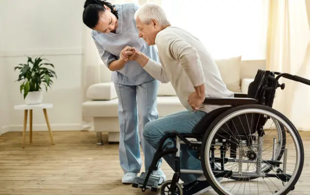 Man getting out of wheelchair