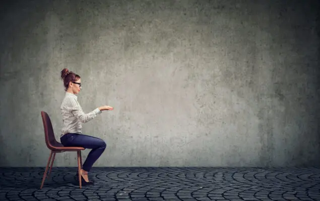 Woman sitting in 90 degrees position