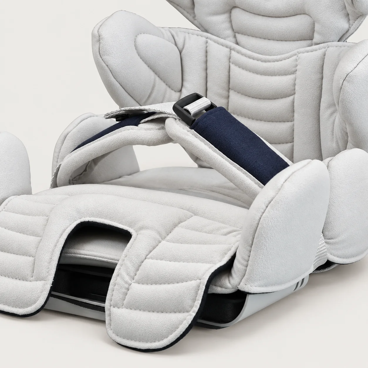 Close-up of the Tarta Kid Seating System's footplate and central harness buckle