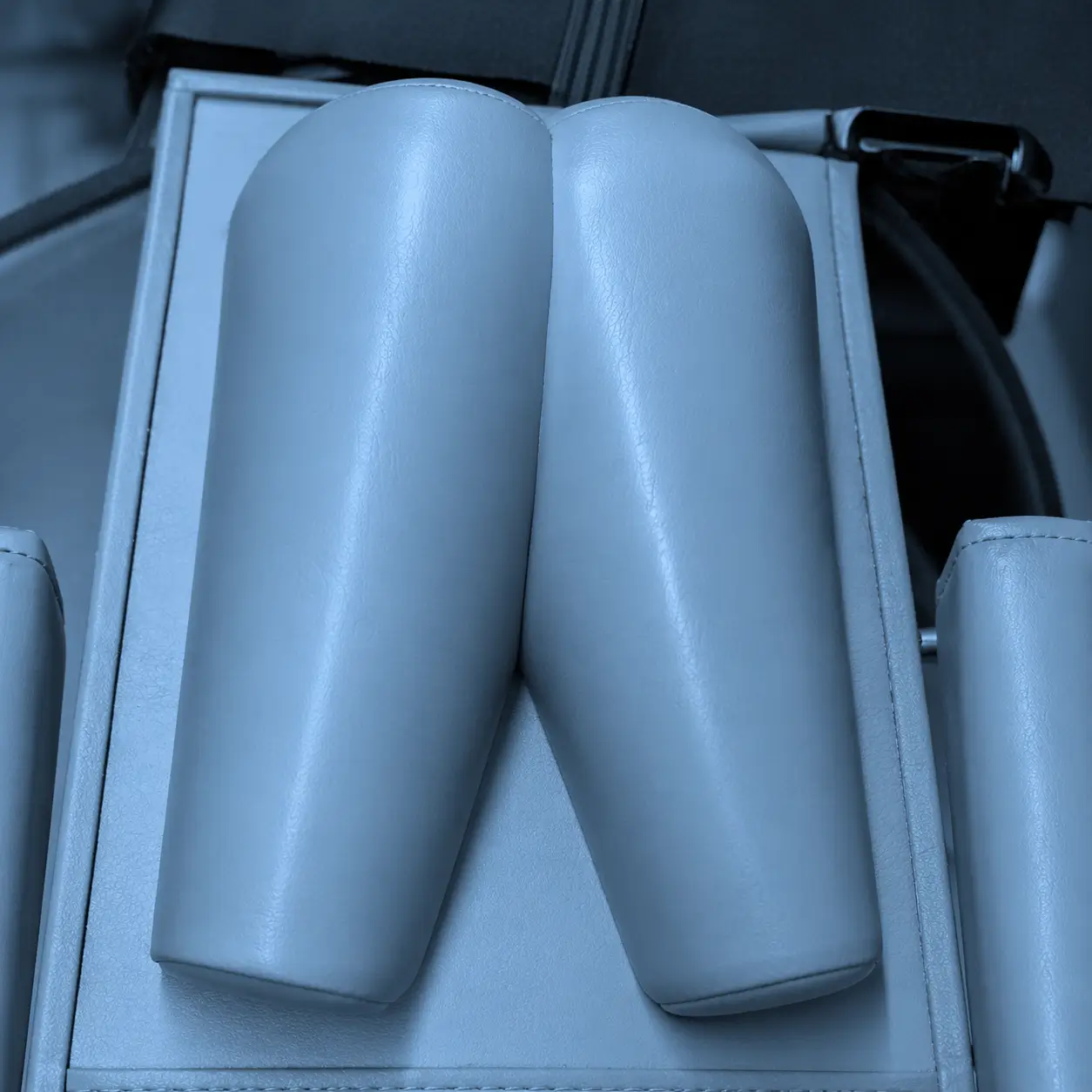 Close-up of wheelchair cushion padding used in impact damping testing.