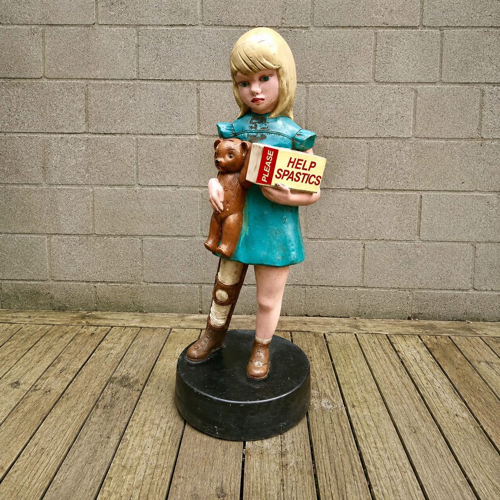 
Spastics charitable collection box.